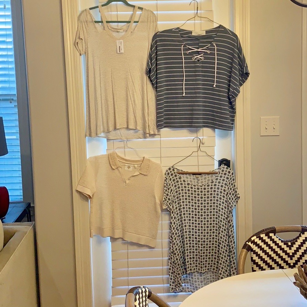 Variety of different brand shirts.